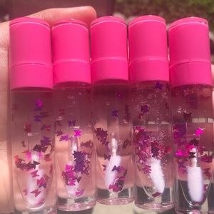 Purple party lipgloss in a wand tube